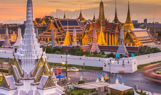 Temple at a busy crossroad in Thailand