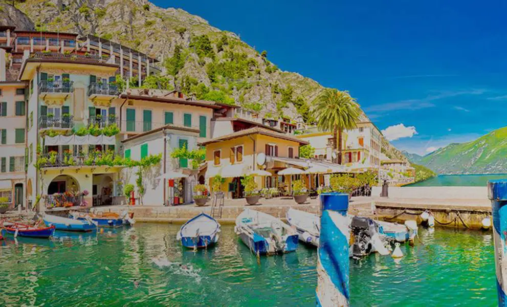 Some small boats docked in a harbour, Italy